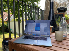 Computer on wooden table